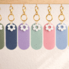 All Colours_keychain Laser Acrylic Shapes : Pastel Acrylic Range : Blank Oval Keychain with White Flower Charm